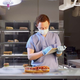 A technician examines the hybrid specimen inside Subway’s sandwich breeding facility, where the first miniature 6-inch breeds of subs were originally developed in the late 1960s.